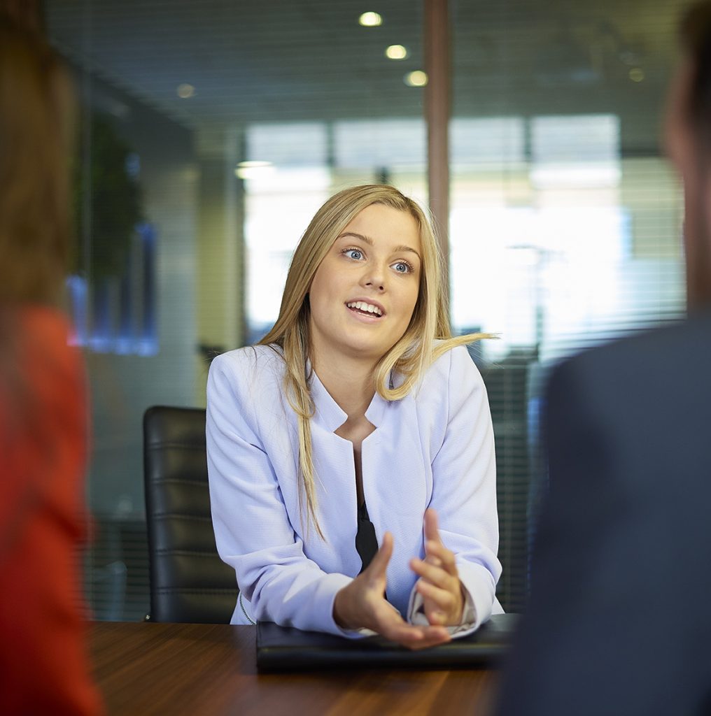 a woman talking in a job interview