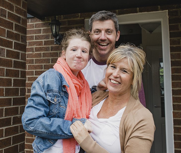 picture of a family with disabled daughter