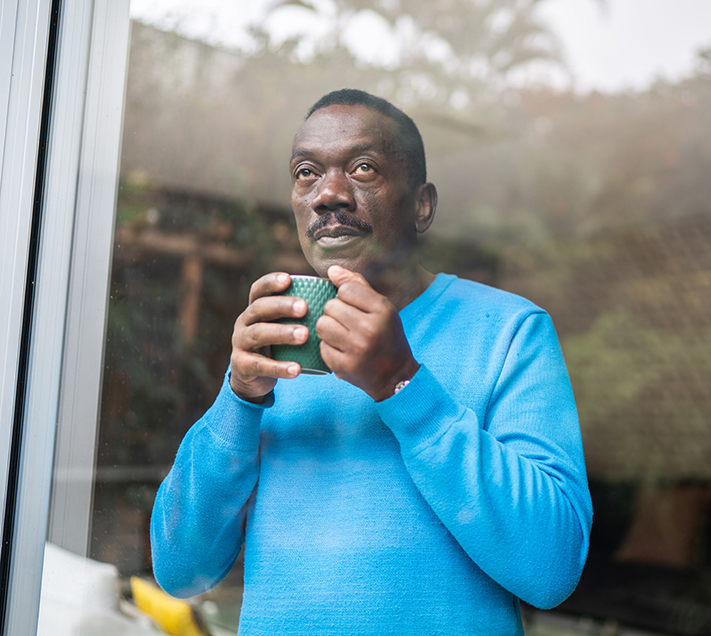 Senior man contemplating at home