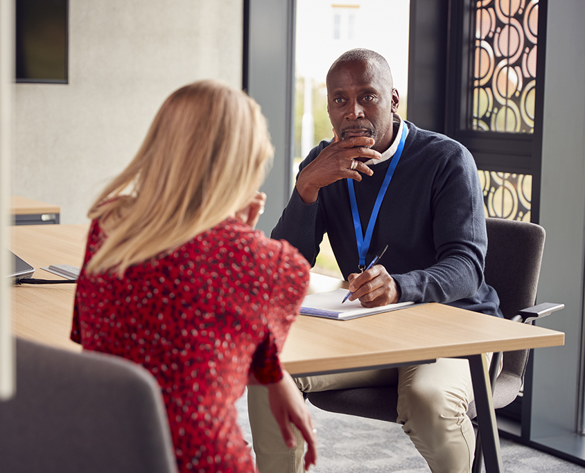 A woman having a session with a counsellor