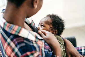 Woman holding her baby