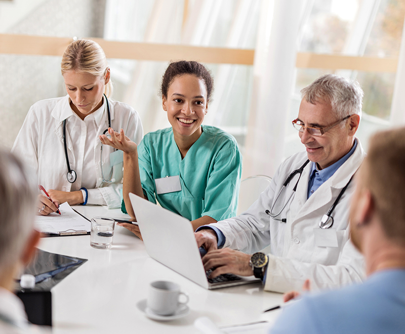 A group of medical experts discussing with each other