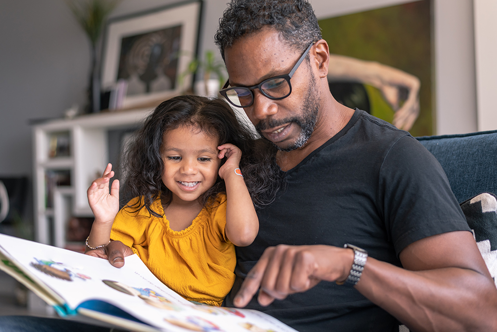 A parent explaining about epilepsy to their child.