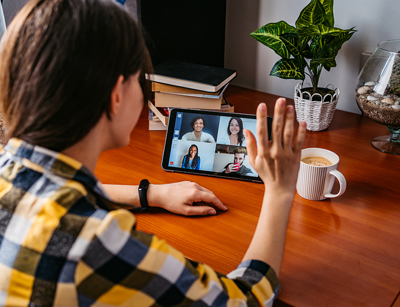 Woman having a video call with friends