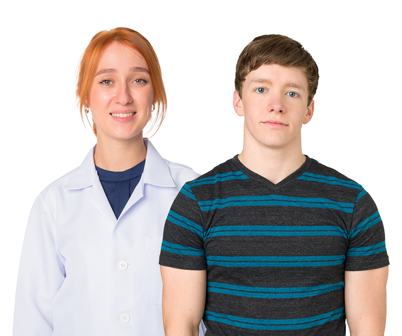 A boy with epilepsy standing next to a female doctor