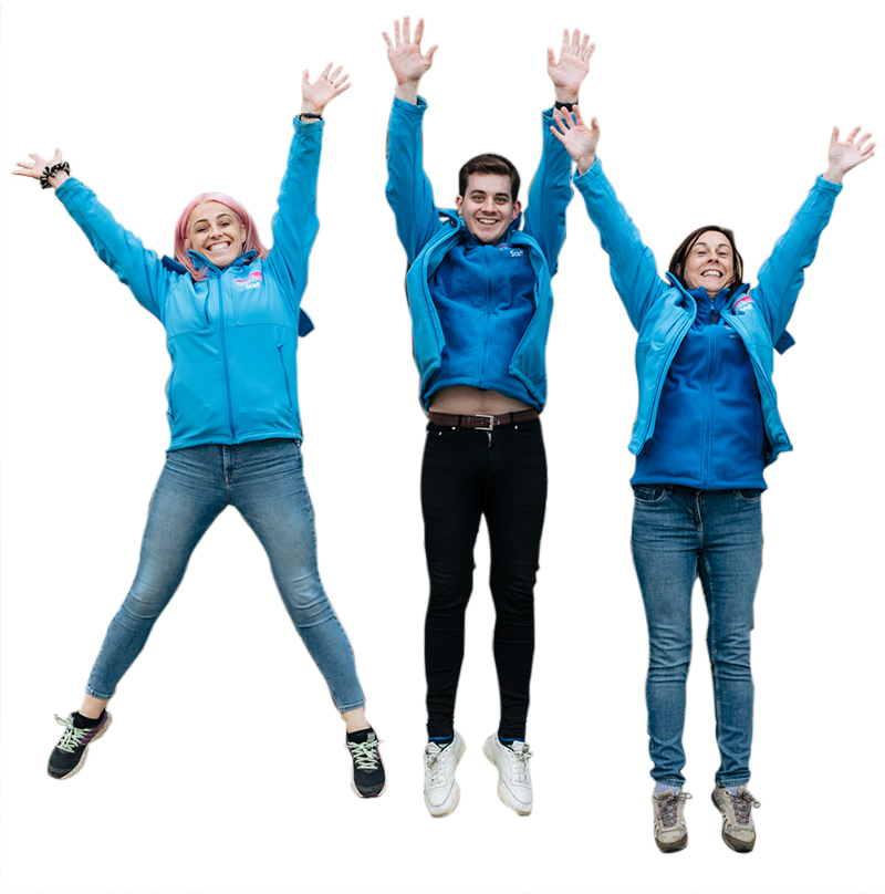 three Epilepsy Action volunteers jumping with joy