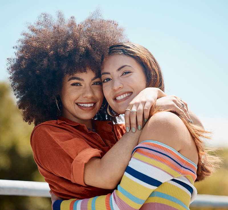 Two women hugging