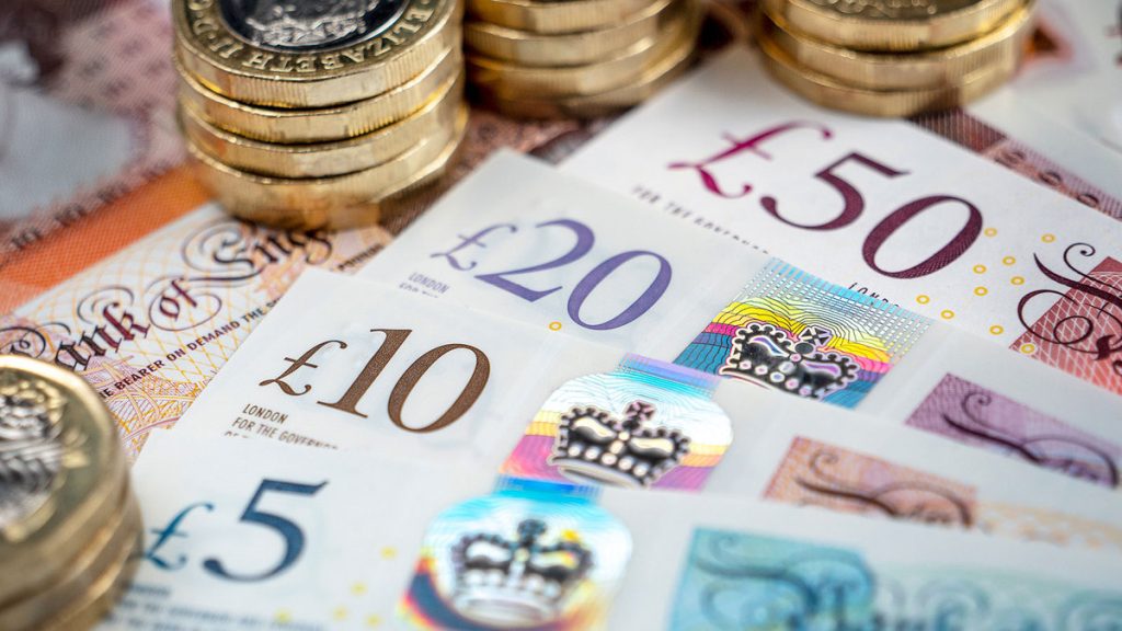 A selection of pound notes and pound coins