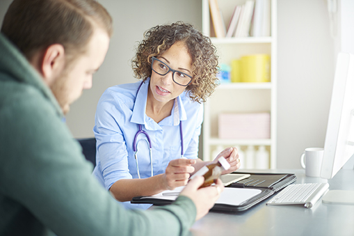 GP giving prescription advice to man under 55 years old