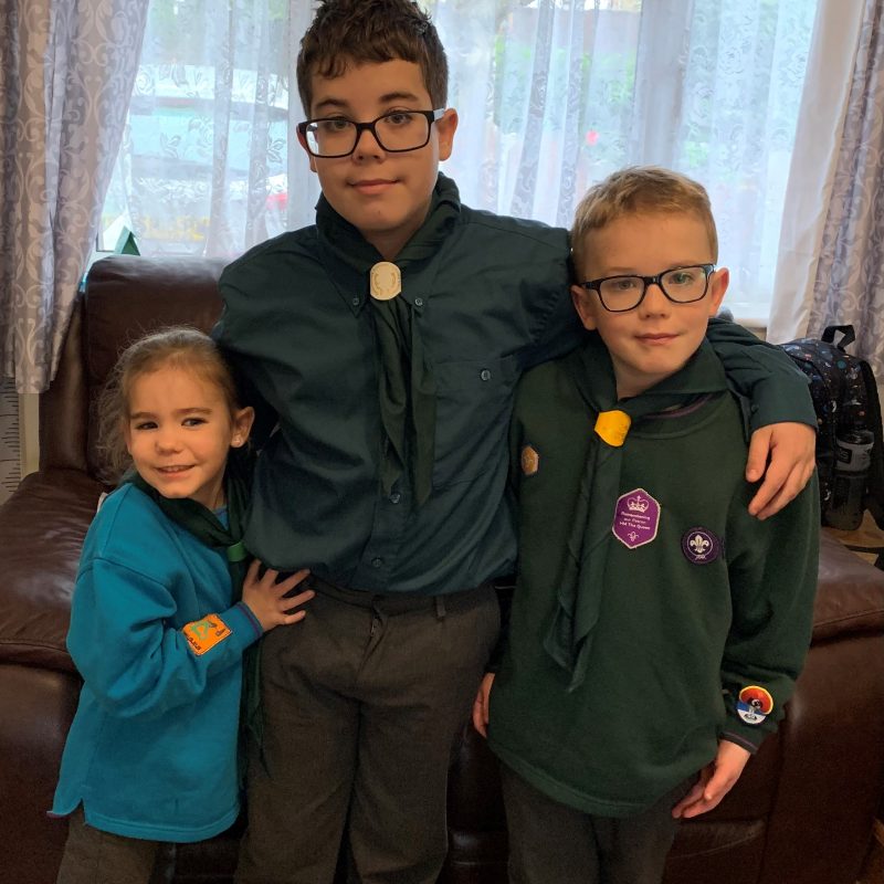 Sam, Ollie and their sister Charlotte linking arms. Sam, Ollie and their sister Charlotte linking arms.