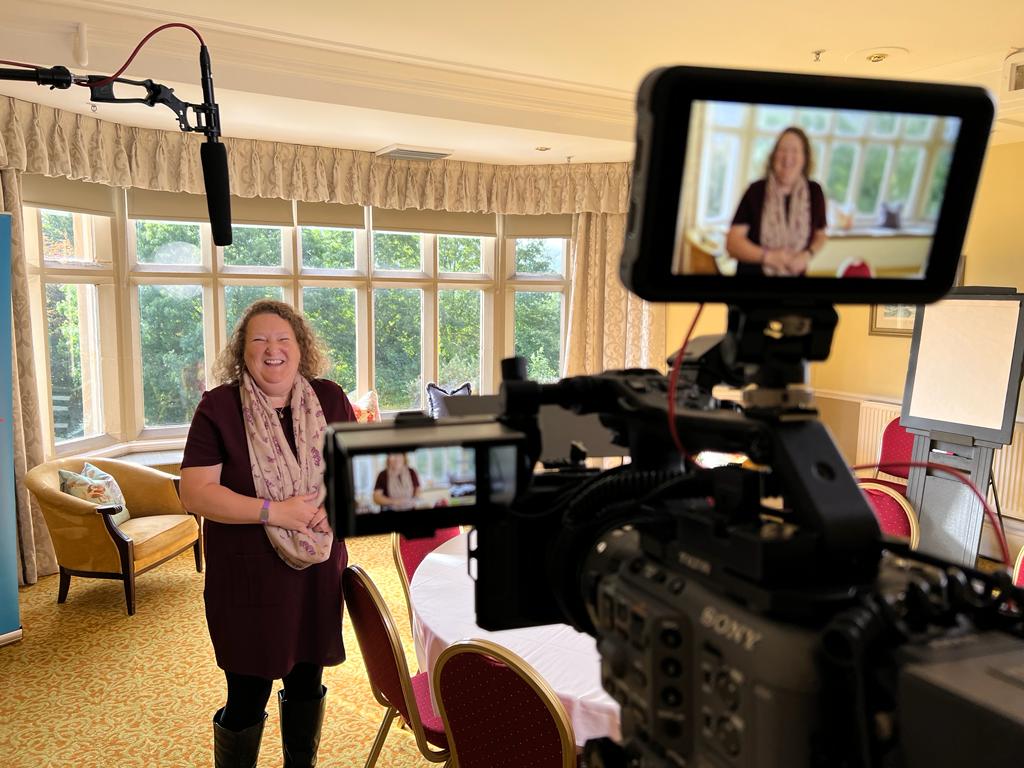 Smiling lady looking at camera