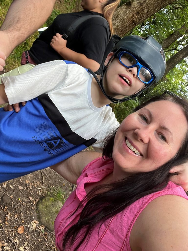 Joanne and Ben taking a selfie together outside