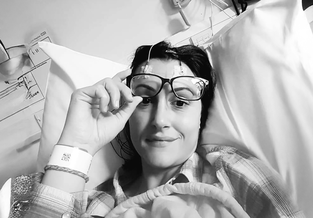 Chloe in hospital bed Chloe in hospital bed