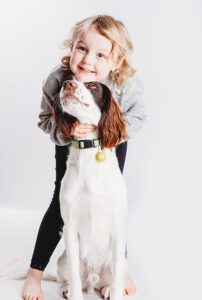 Martha cuddling her dog Chip