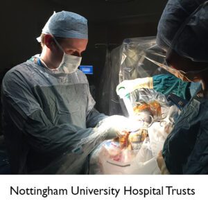 Surgeons performing brain surgery