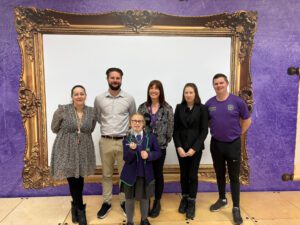Amelia with the staff of chapel hill primary school