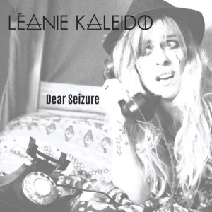 Artwork for singer and songwriter Leanie Kaleido's new song about epilepsy, Dear Seizure, featuring her wearing a black hate and speaking on an old time phone