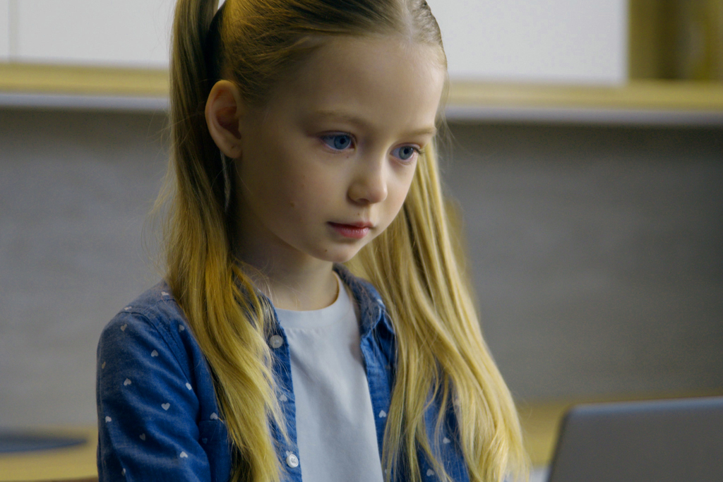 An image of a young girl staring