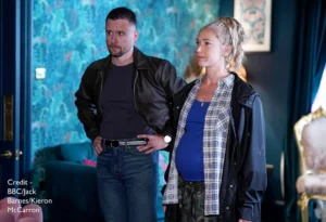 Pregnant nancy carter standing next to her brother lee carter in tonight's episode of eastenders
